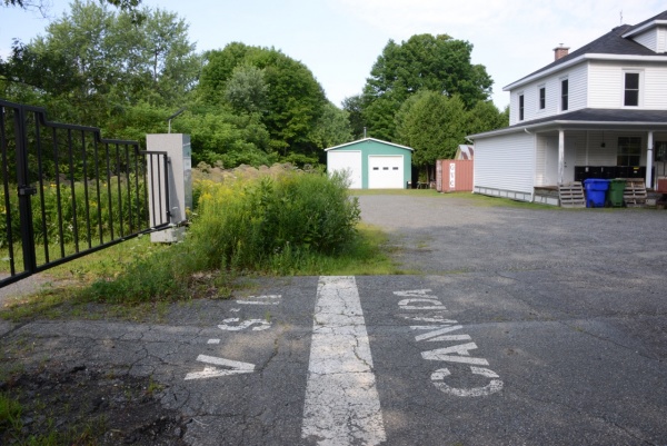 The international boundary in Derby Line, VT. Centre for Land Use Interpretation photo.