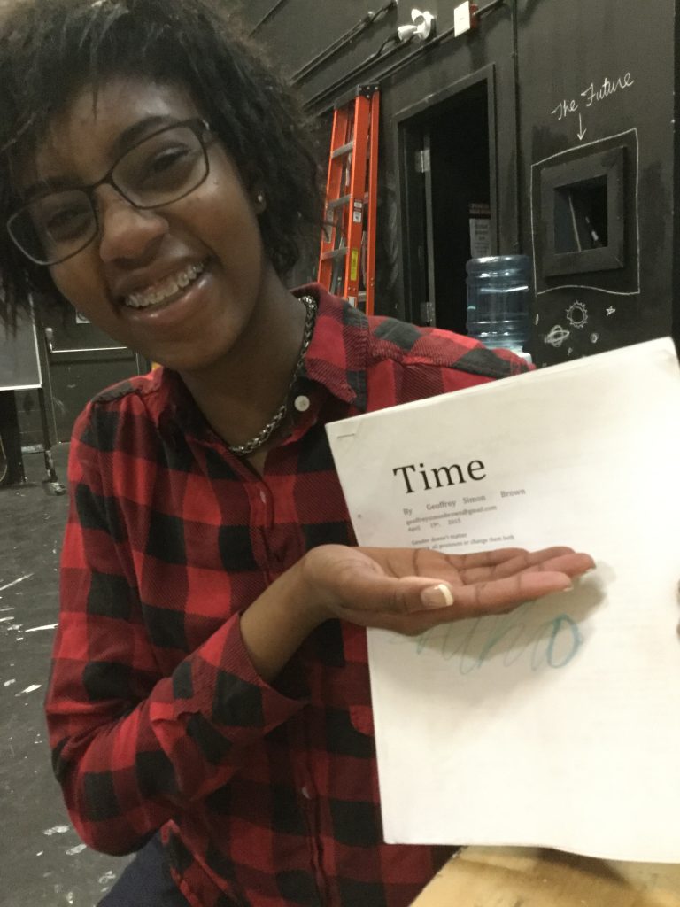 Nika holding the script for Time by Geoffrey Simon Brown
