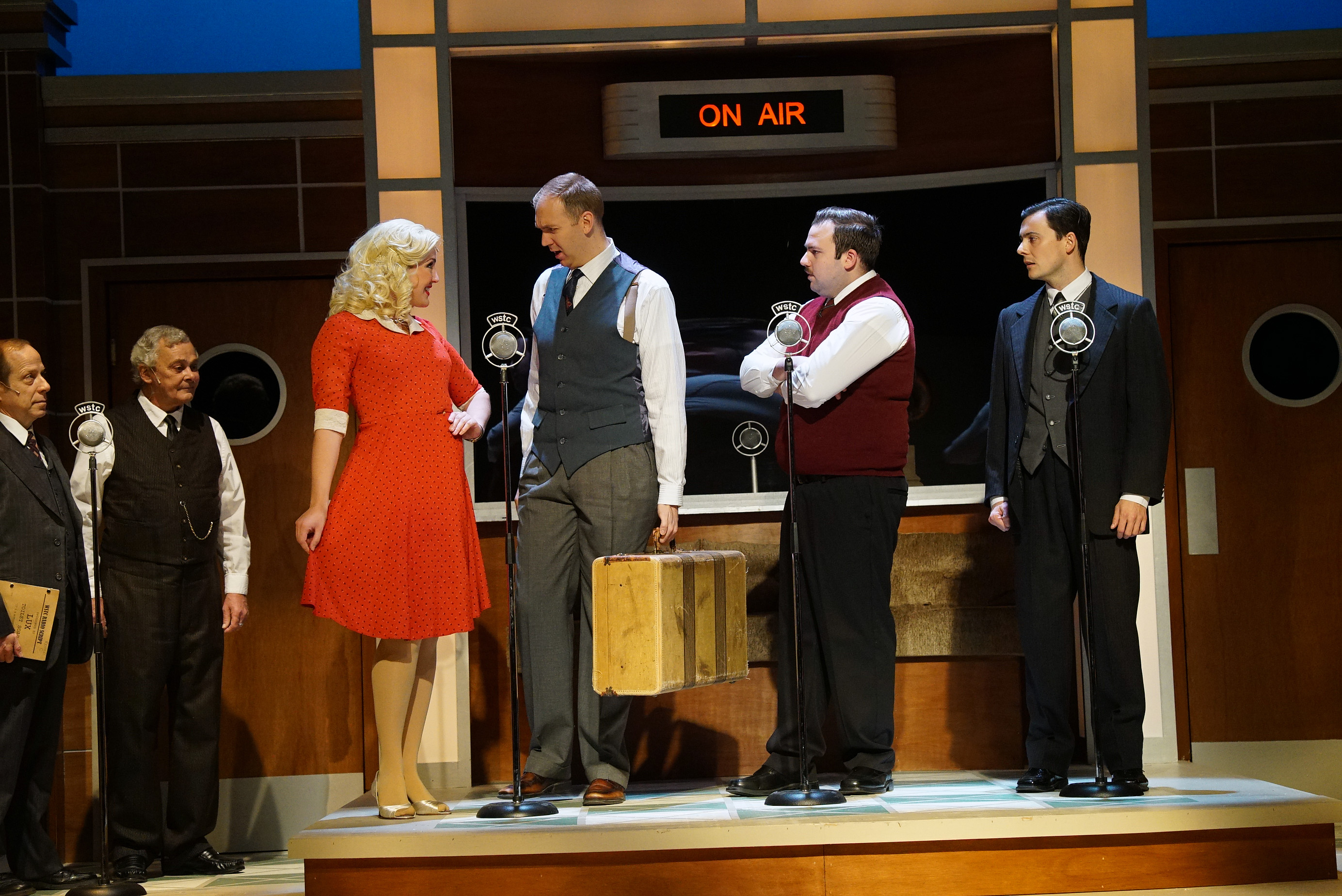 Photo of Sudbury Theatre Centre's production of "It's A Wonderful Life" by Robert Provencher. Actors from left to right: Richard Alan Campbell, Robbie O'Neill, Jessica Vandenberg, Mark Crawford, Richard Barlow, and Kelly Penner
